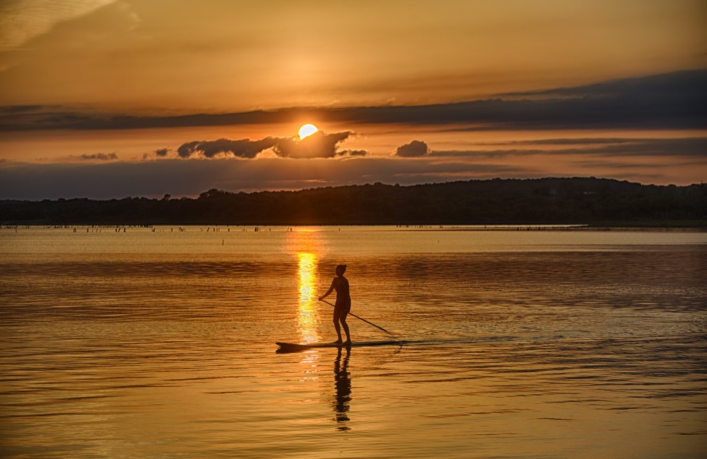 paddle boarding girl